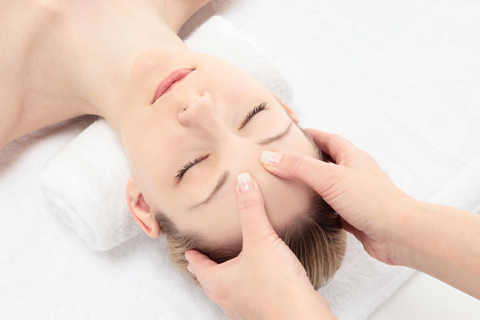 Young Caucasian woman facial massage